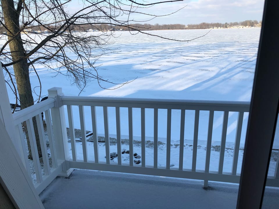 Master balcony overlooking lake (winter photo)