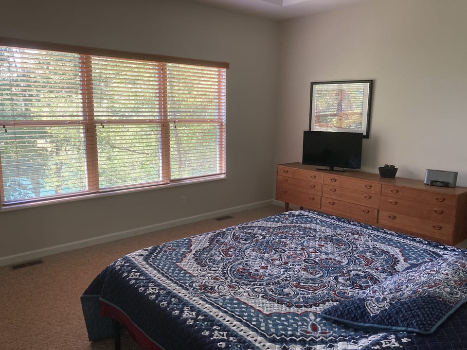 Master bedroom upstairs with view to Alpine Lake 