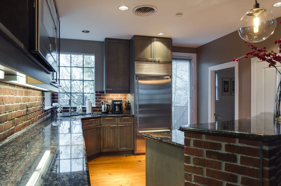 kitchen overlooking the back yard and bamboo  trees.