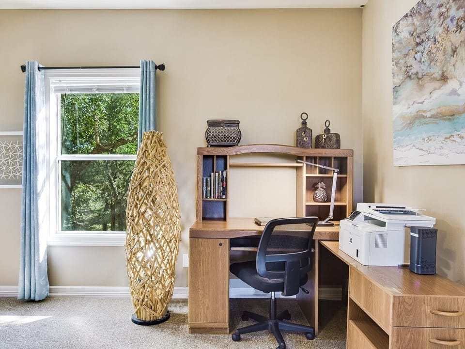 Work space with printer in primary bedroom 