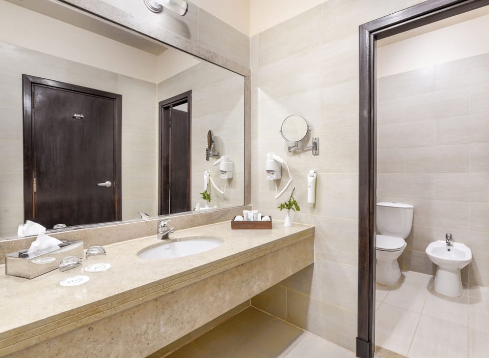 Family Double Room, Pool View (Deluxe, Jaz Bluemarine) | Bathroom | Shower, hair dryer, towels