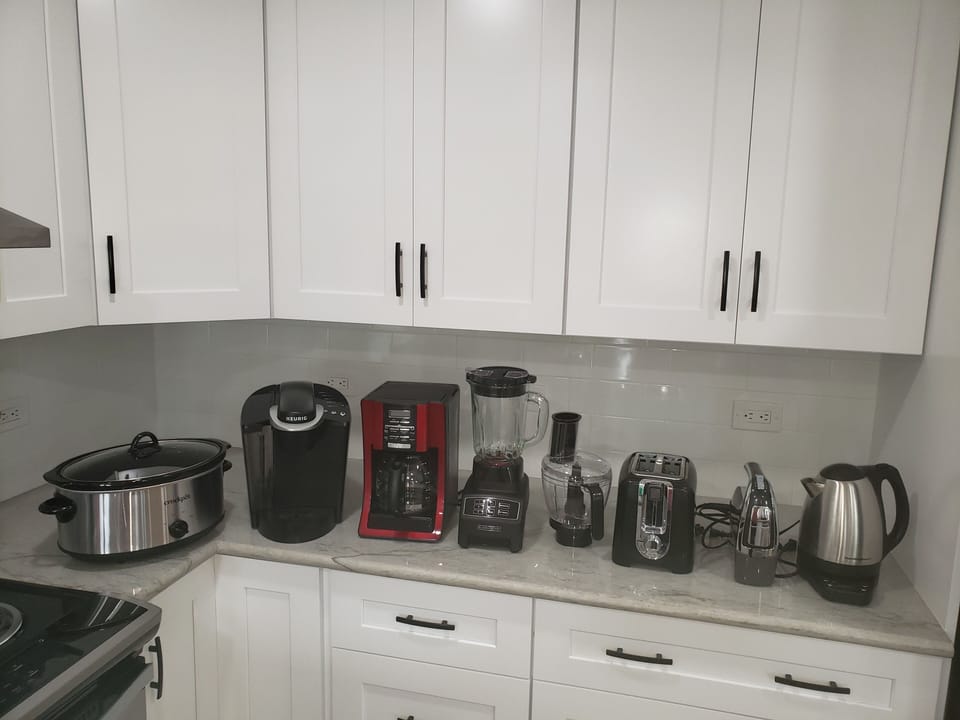 Kitchen is well-stocked with all necessities.
