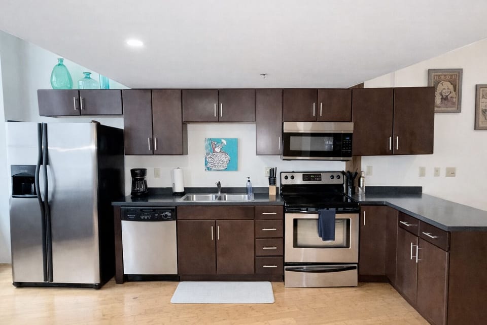 Full kitchen with standard drip coffee maker.