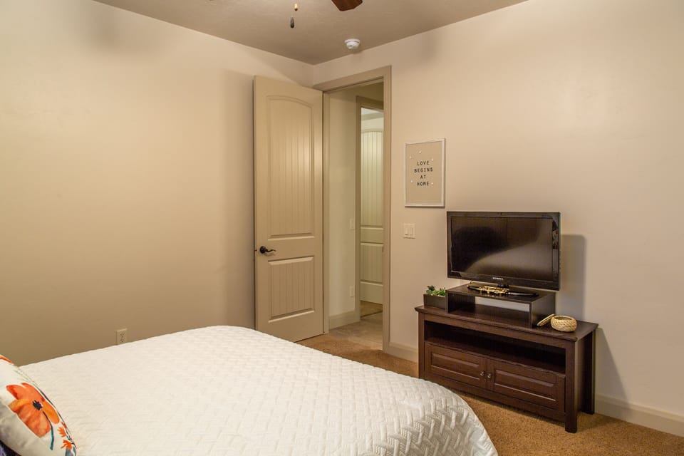 Queen room with Roku TV