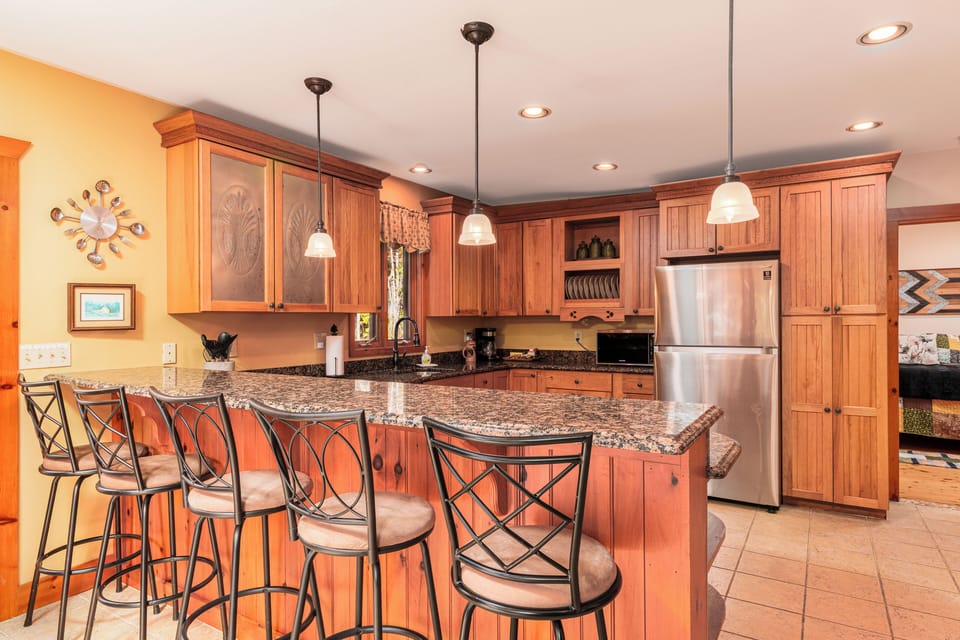 Spacious kitchen with island seating for gathering and entertaining
