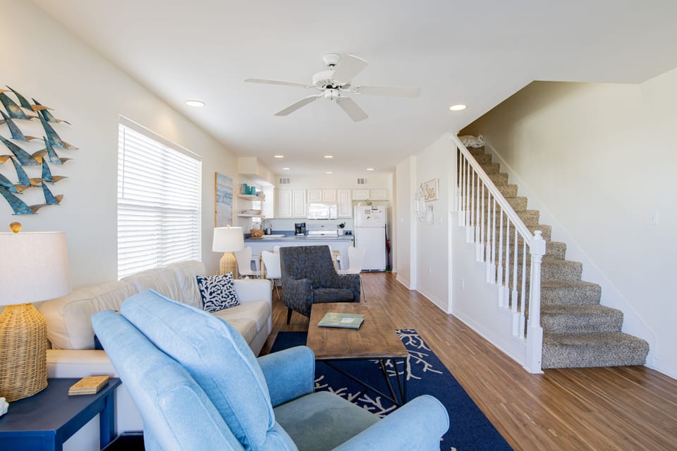 Stairs lead to upstairs Master king suite, bunk bedroom with ensuite, & laundry.