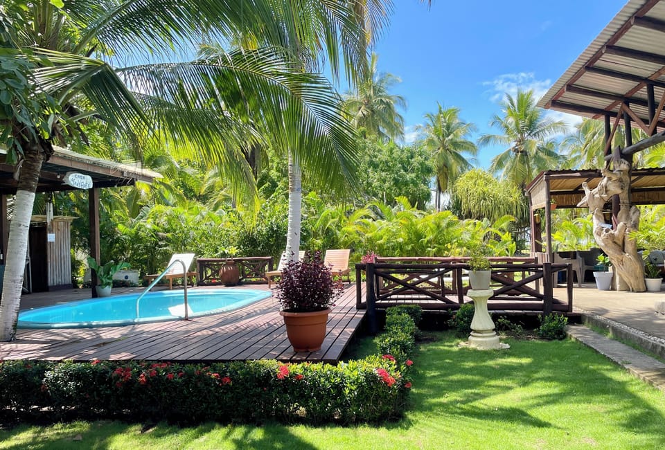 Swimming pool with wooden deck ideal to practice yoga.