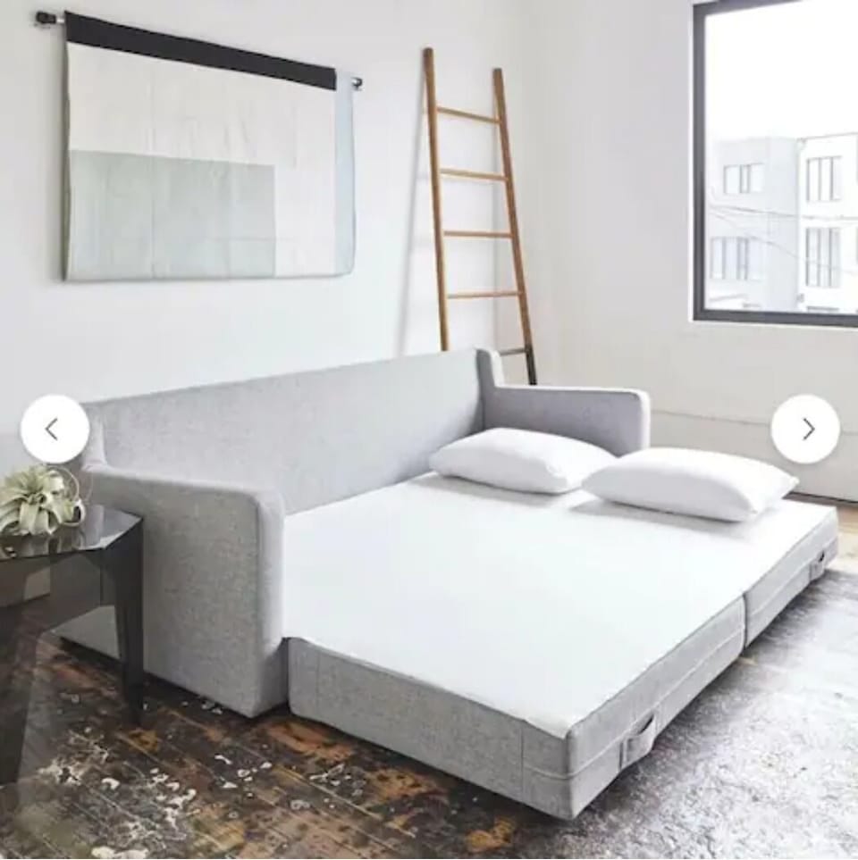 This is the new sofa bed in our unit - a catalog photo, not in our living room!
