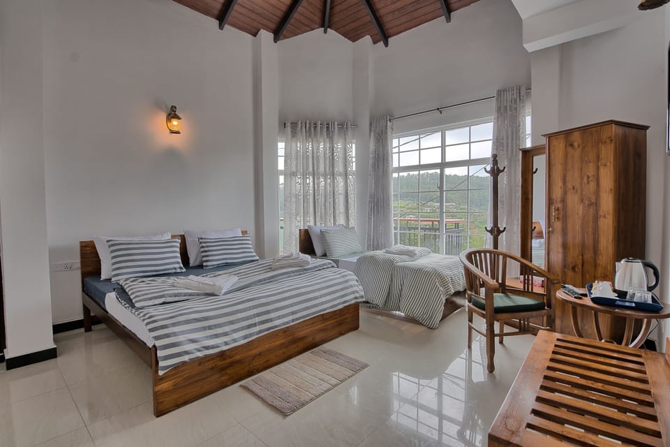 Deluxe Triple Room, Multiple Beds, Non Smoking, Mountain View | Egyptian cotton sheets, premium bedding, memory foam beds, in-room safe