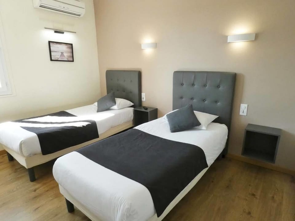 Twin Room, 2 Twin Beds, Non Smoking | Desk, blackout drapes, soundproofing, cribs/infant beds