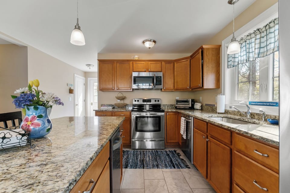 Full Kitchen - walk in closet near by for pantry food / supply items you bring.