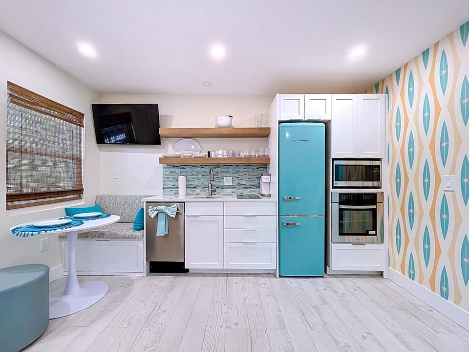 updated kitchen with built in bench seating with under-bench storage