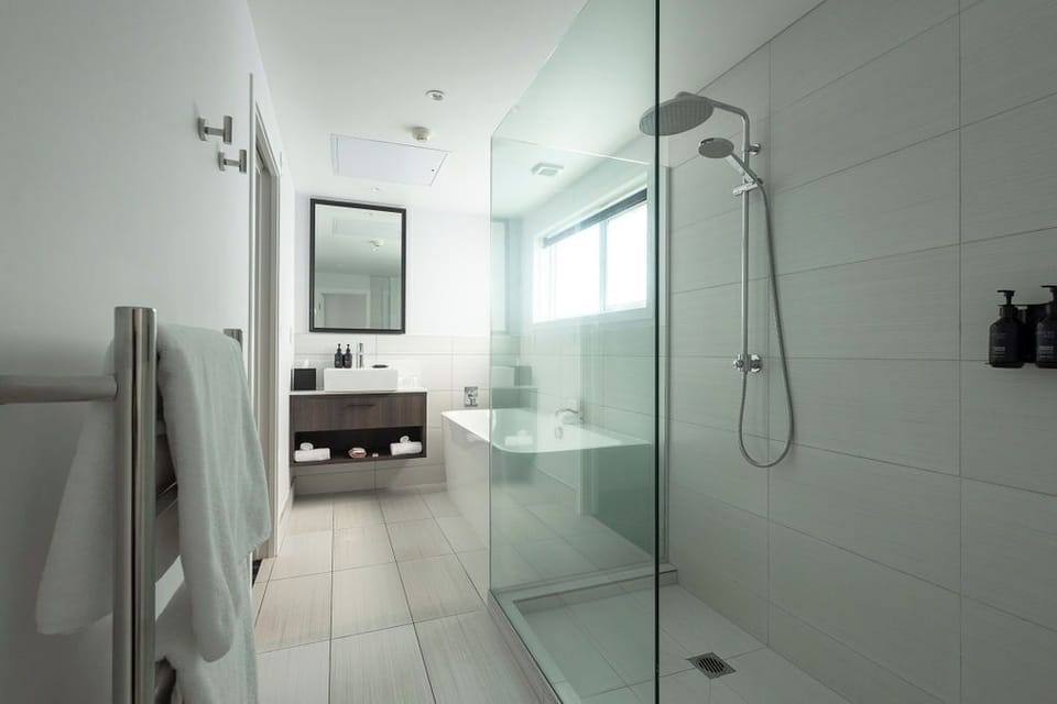 Family Suite, 2 Bedrooms | Bathroom | Shower, rainfall showerhead, free toiletries, hair dryer