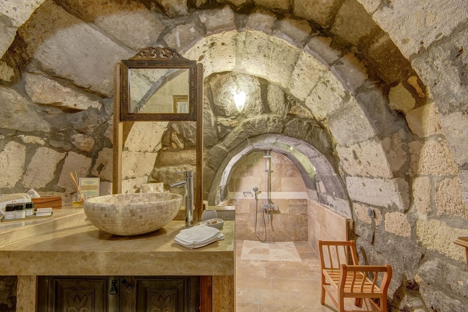 Suite with Terrace and Fireplace | Bathroom | Shower, eco-friendly toiletries, hair dryer, slippers