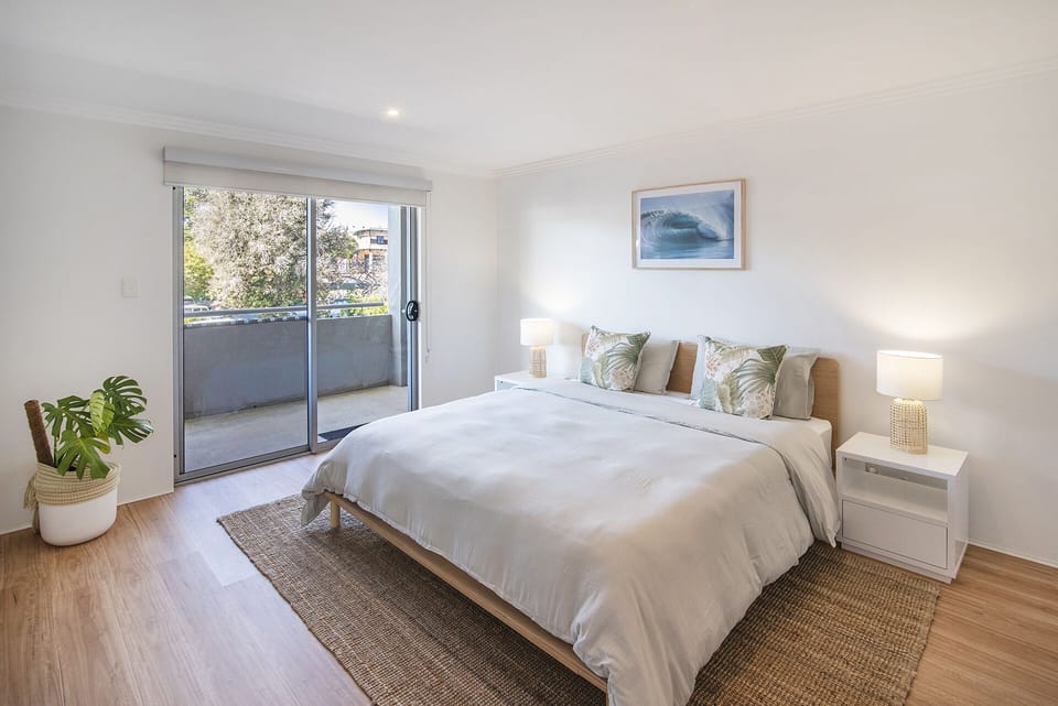 The spacious master bedroom has a King bed, an ensuite and walk in robe.