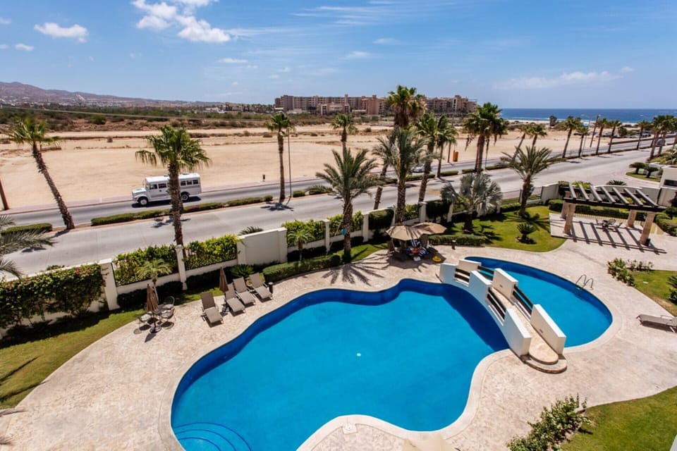 View from your balcony to one of 2 pools below. 
