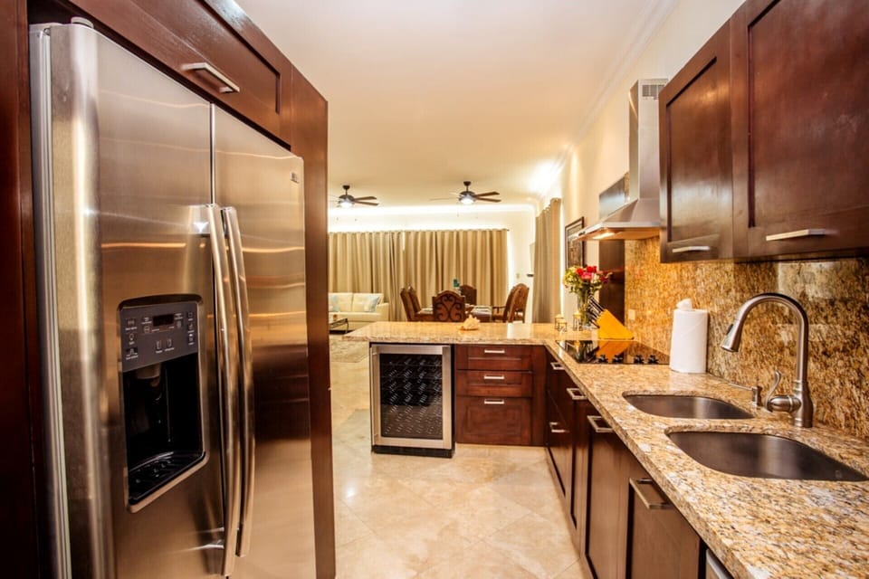kitchen has wine cooler; Large fridge w/ filtered water  for ice and drinking.