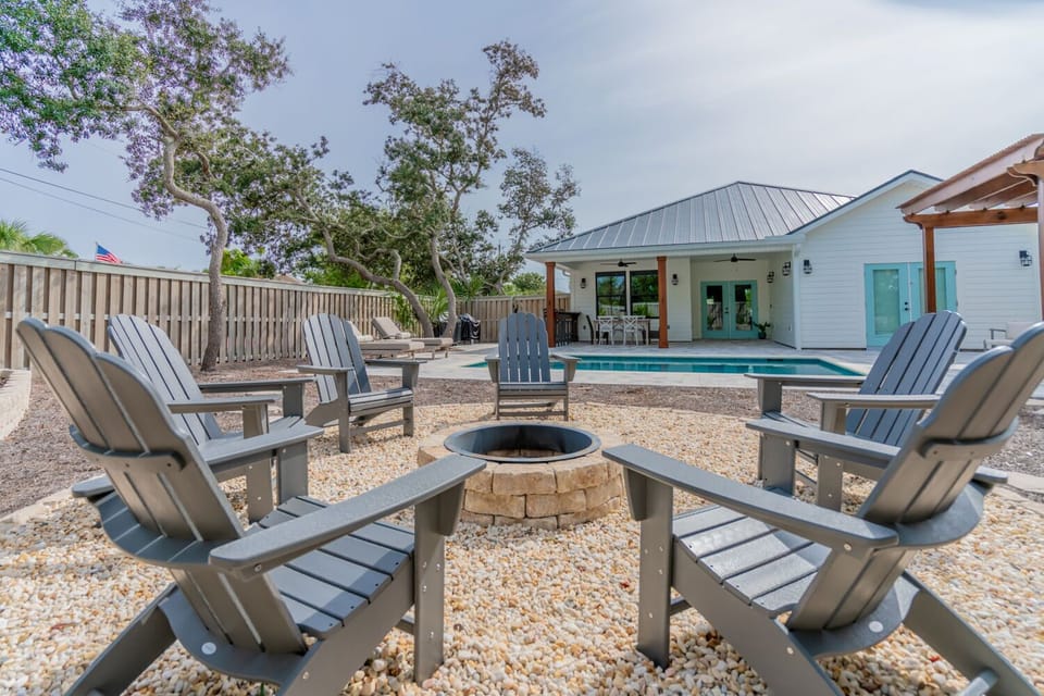 Bid-A-Wee Beach Bungalow | Private Backyard Firepit | Heatable* Pool | Outdoor Loungers & Grilling Area