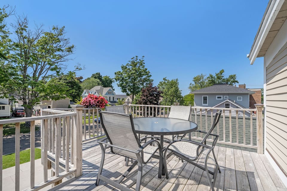 Relax on the sun soaked second floor deck at the Michiana Apartment #4!
