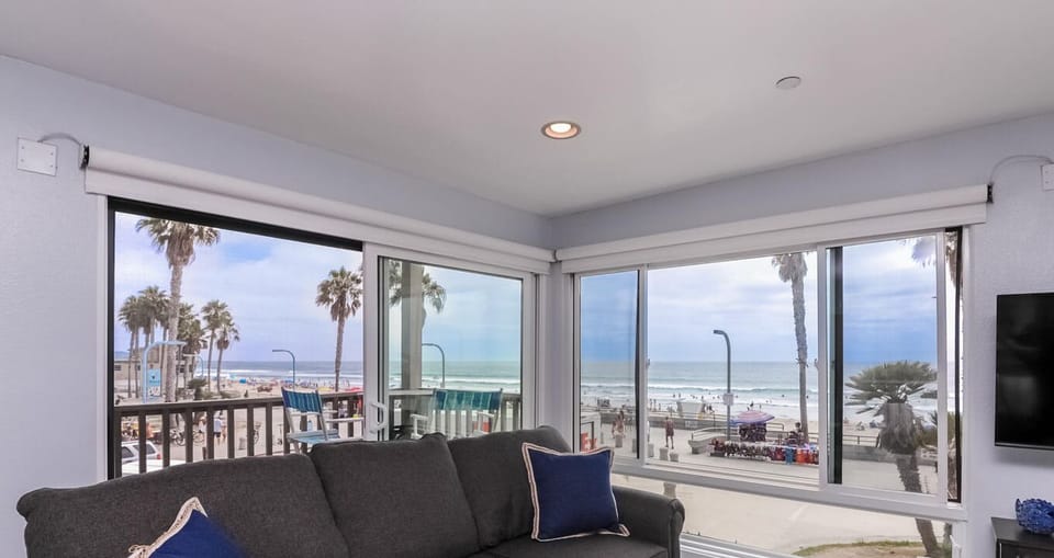 Living Room w/Ocean and Beach Views 
Also Balcony in the Background