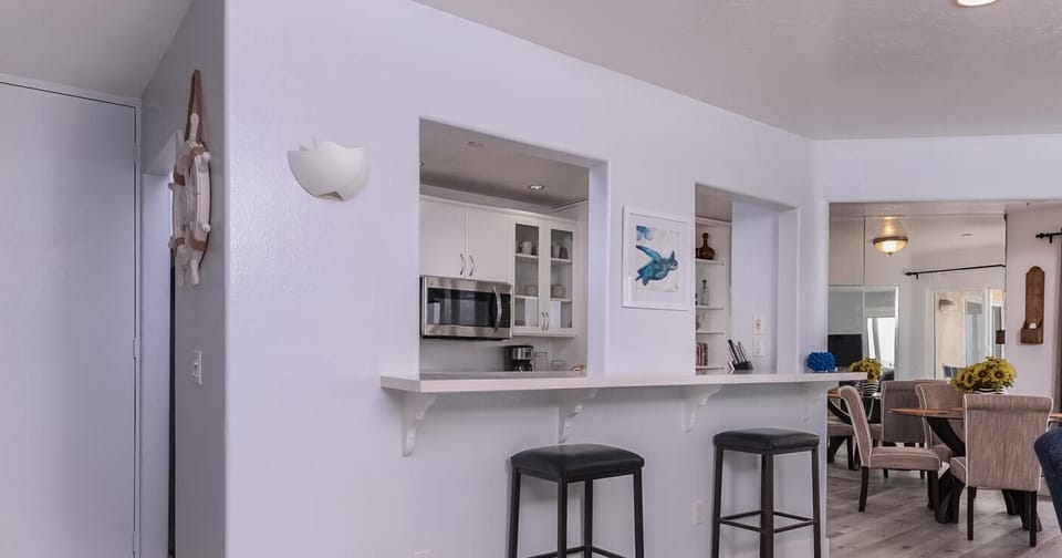 Bar Countertop with Chairs w/Dining Room in Background
