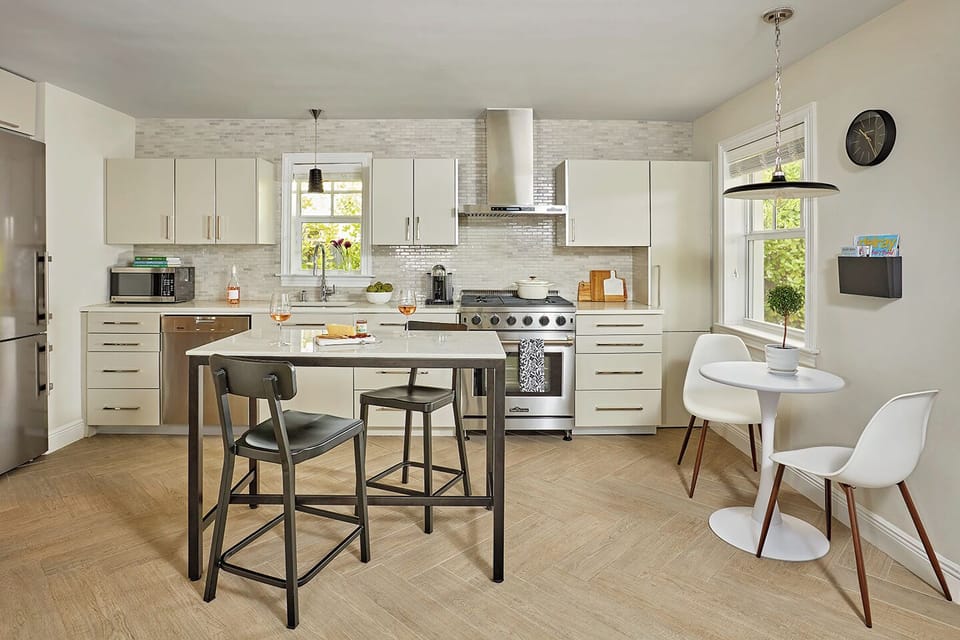 Enjoy a professional chef's kitchen complete w/ a gas range and quartz counters.