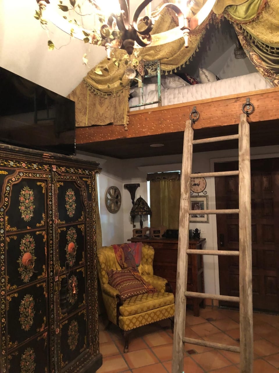 Main cottage ladder into loft.