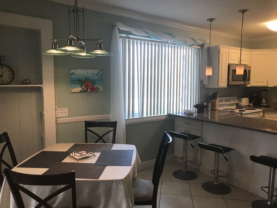 Large unit#2-View of Dining Table-Sitting for 3 at Kitchen Granite TopIsland