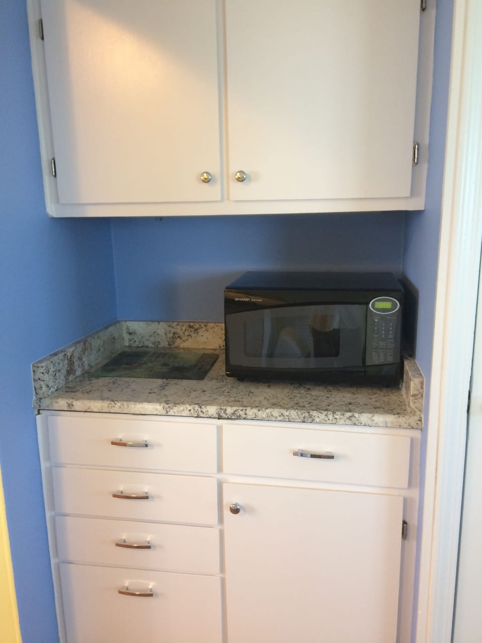 Kitchen area with new granite counter top