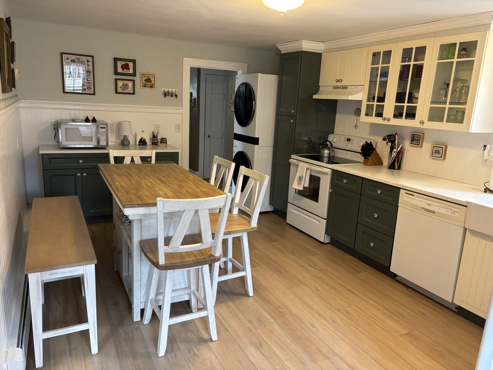 Kitchen table has butterfly expansion option.