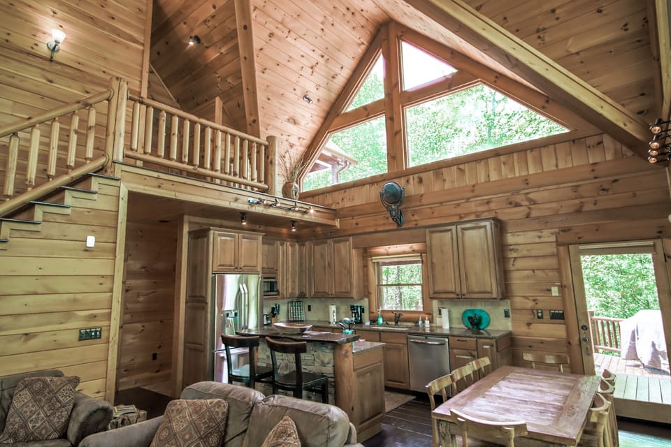 High Cathedral Ceilings & Huge Glass Panels Bring in a Bounty of Natural Light