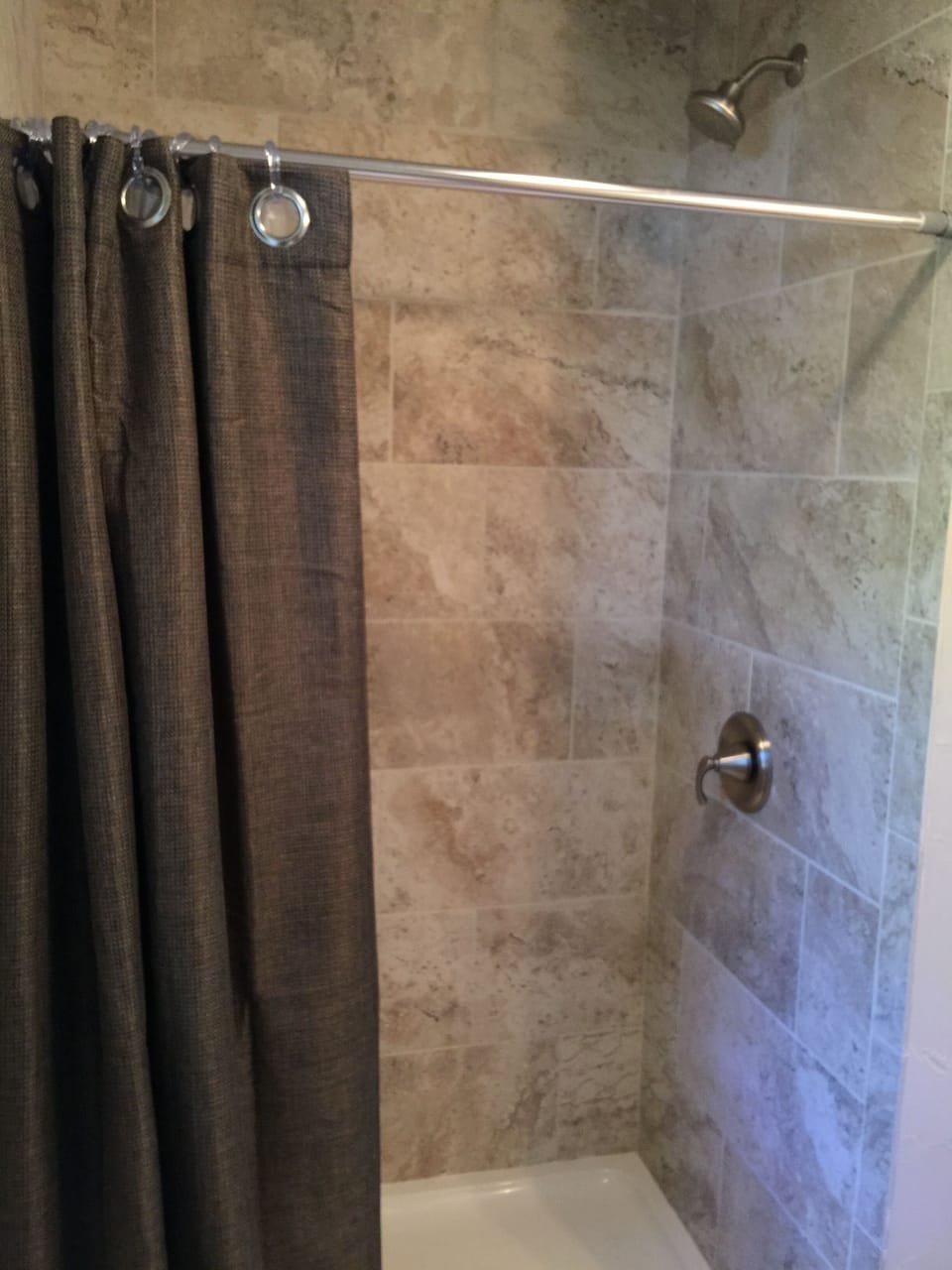 Brand new tile and shower fixtures !