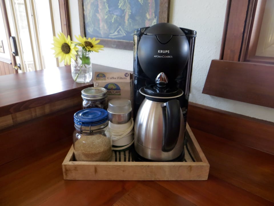Locally roasted whole organic coffee beans + organic sugar provided. 
