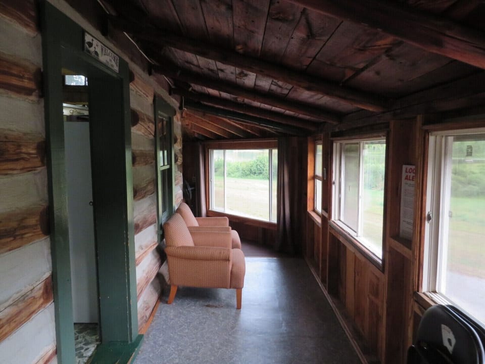Porch overlooking the grounds and lake