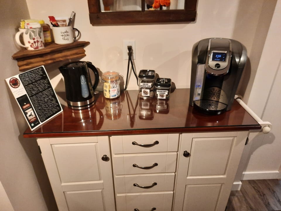 Keurig Coffee station includes starter coffee pods, tea, sugar, honey & creamo.