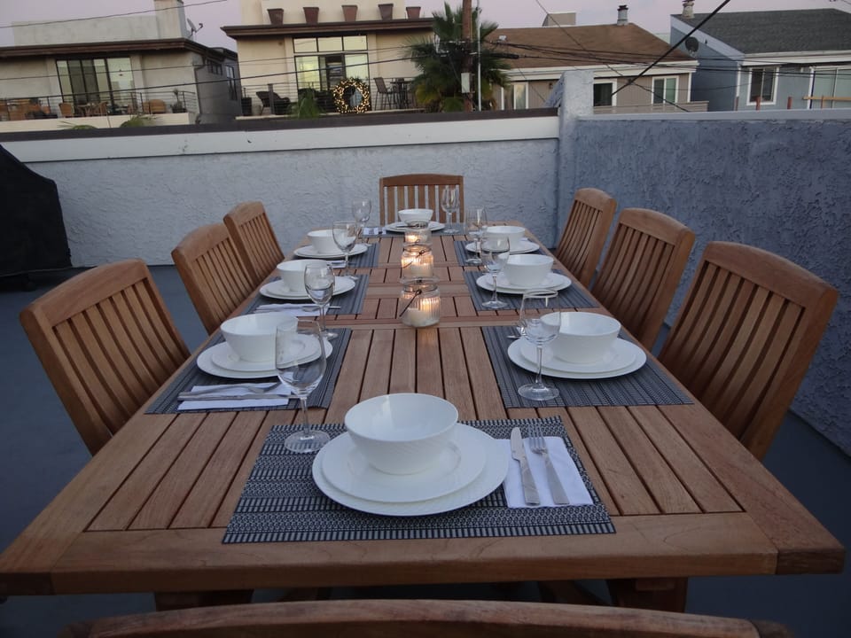 Teak Dining on Rooftop deck. Chairs for 8