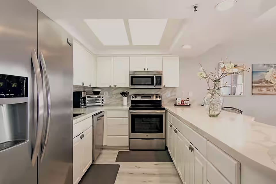 Whip up seaside-inspired feasts in this bright, modern kitchen retreat.