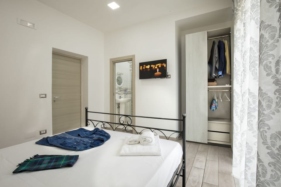 Frette Italian sheets, premium bedding, down comforters