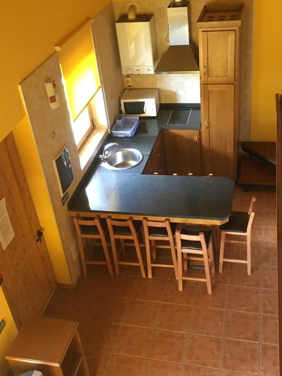 Full-size fridge, microwave, stovetop, coffee/tea maker