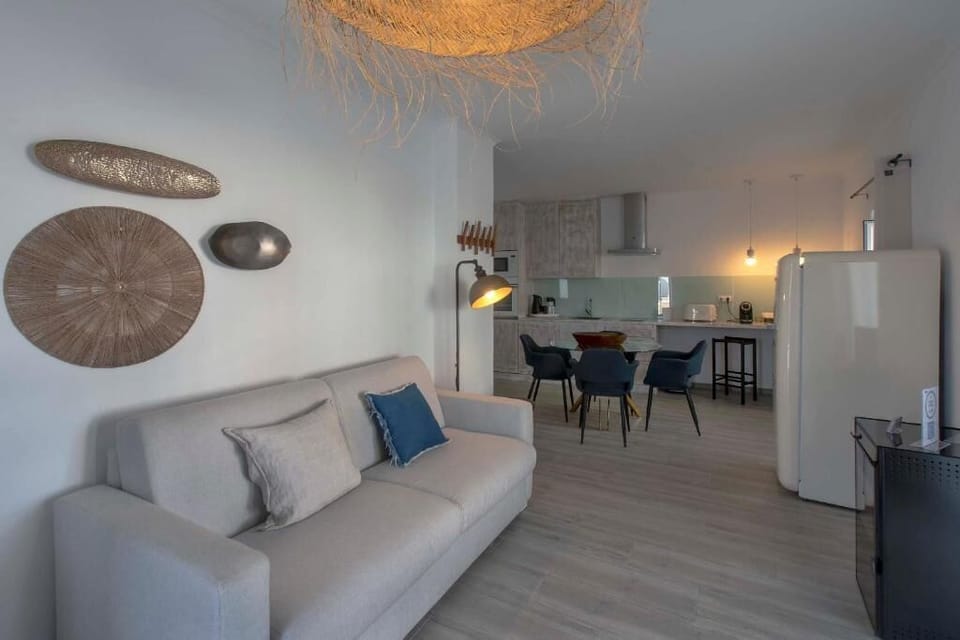 Deluxe Villa | Living area | Flat-screen TV, fireplace