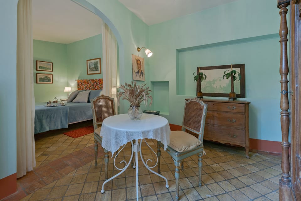 Classic Double Room | Living area | Flat-screen TV