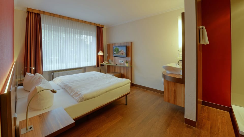 Desk, blackout drapes, free WiFi, bed sheets