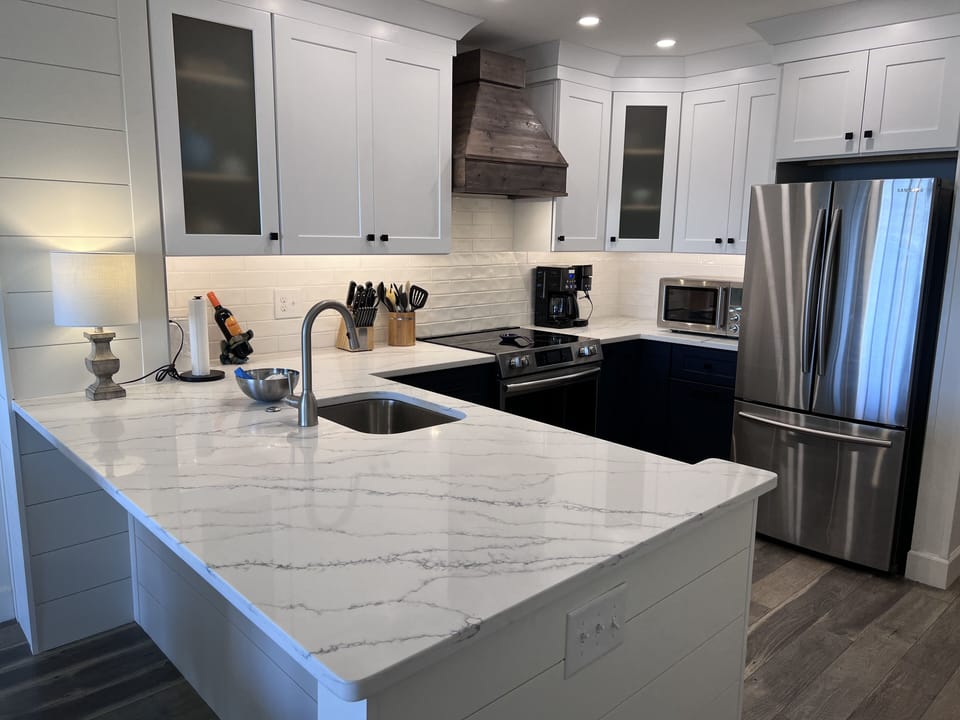 Gorgeous newly renovated kitchen with sophisticated, smart, stainless appliances