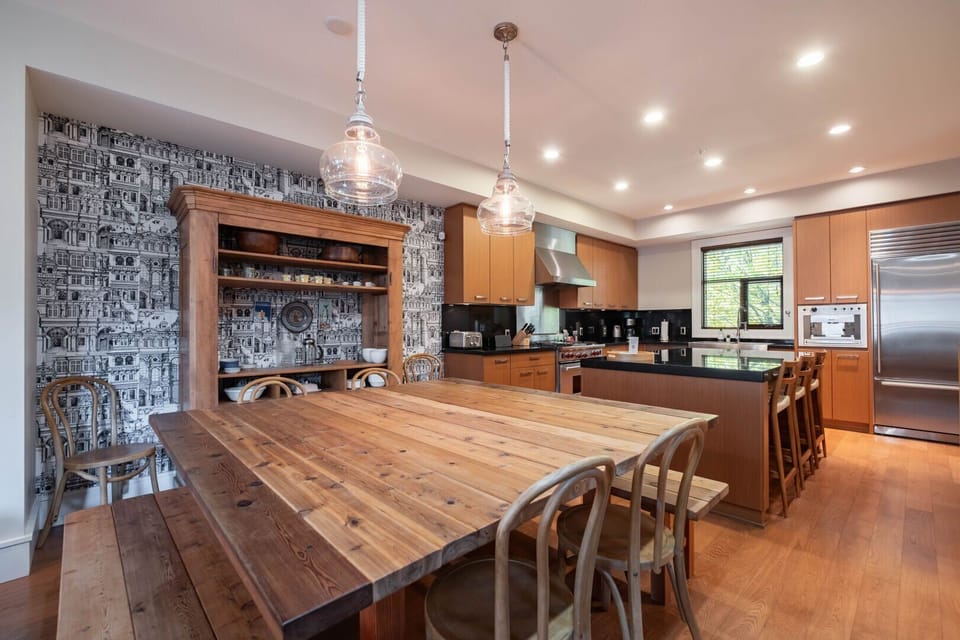 Dining and kitchen area
(Table opens and can seat up to 12 people)