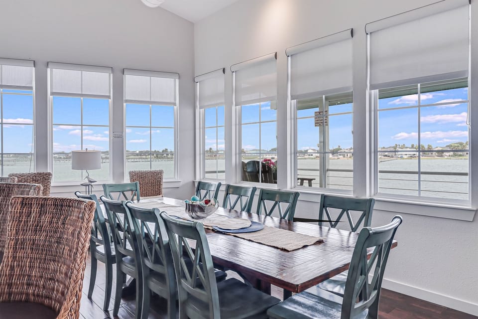 Open dining area that seats 10 with Little Bay water views.