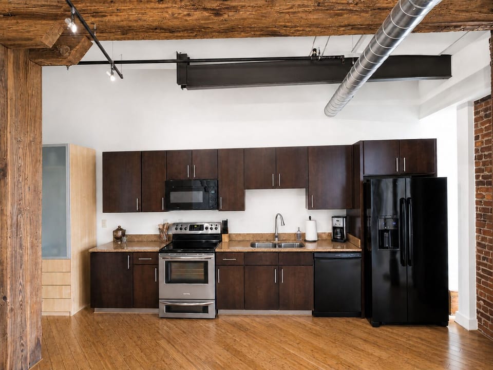 Full kitchen with standard drip coffee maker.