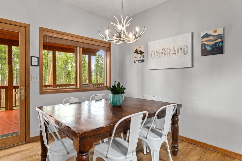 Dining table can be extended to fit 10 with bar seating in both kitchens for 8