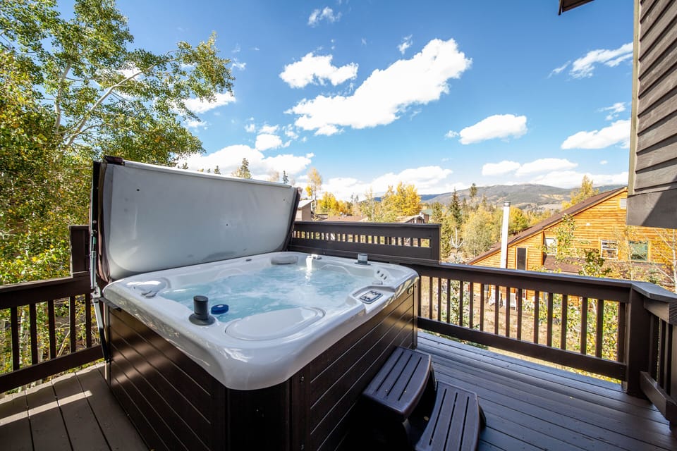 Unwind in the private hot tub under the stars