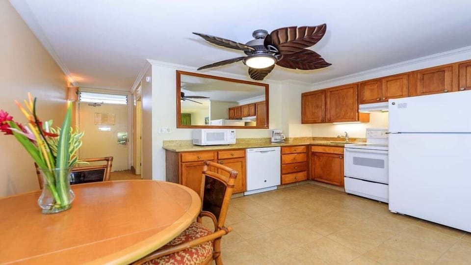 Dining Area with Tropical Accents.
Gather and unwind—bright dining space with cozy island touches.