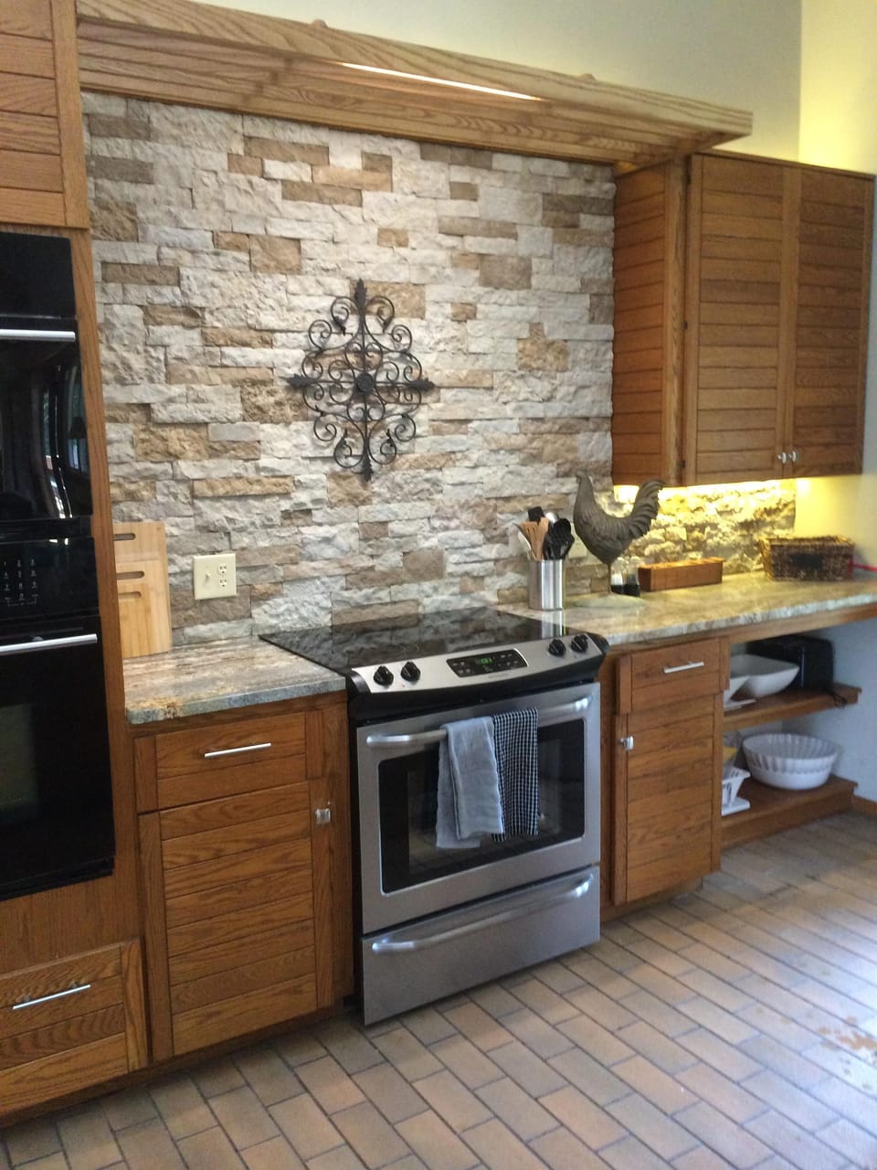 Kitchen with double oven, microwave and a large selection of kitchen aides